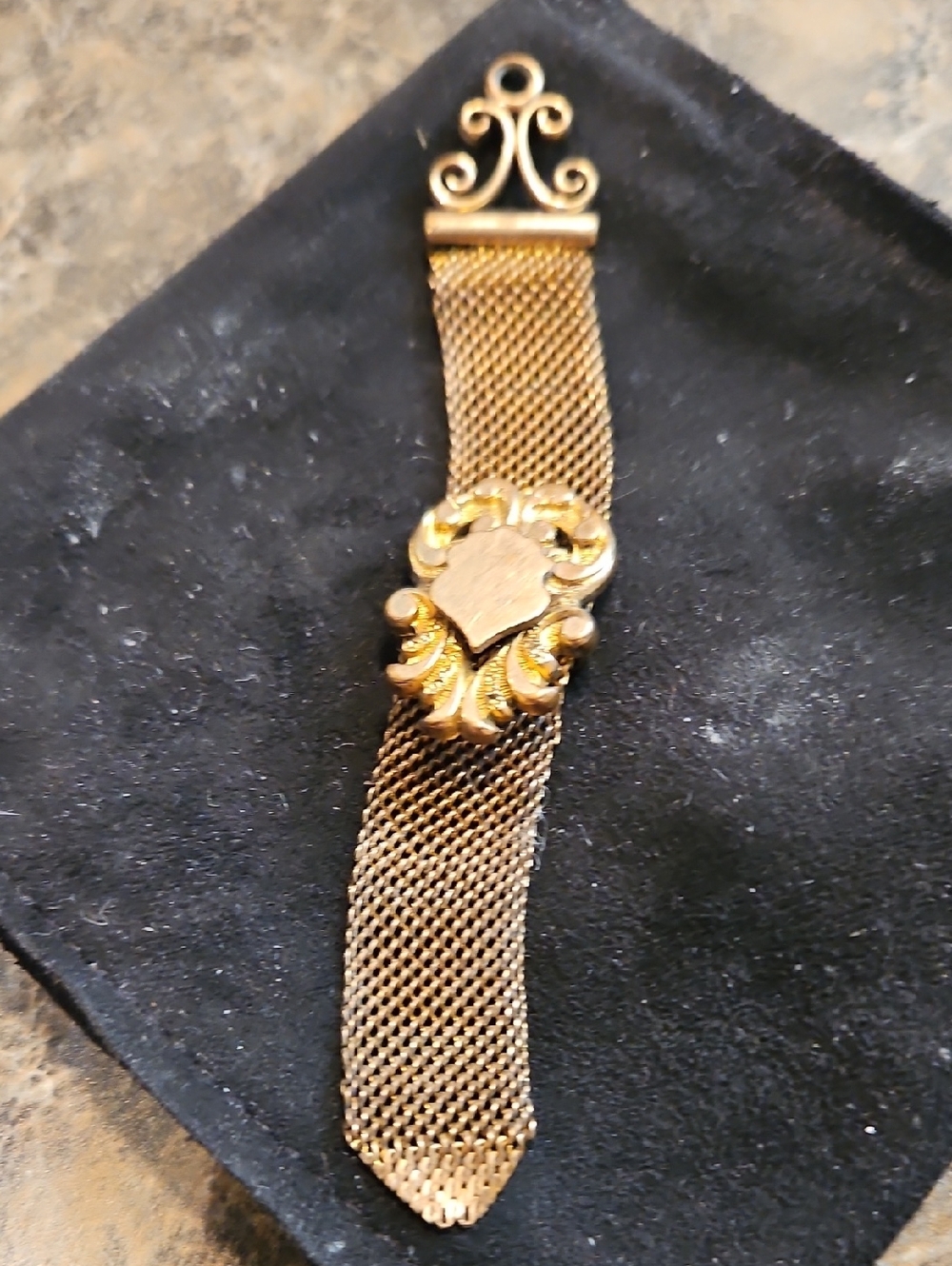 Gold-Tone Mesh Vest Chain Clip with Ornate Shield Accent